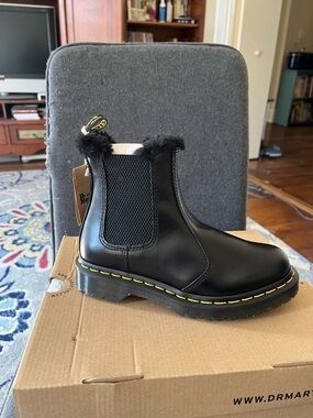 Dr. Martens womens Black Leather Chelsea Boot with Yellow Stitching and Fur Trim